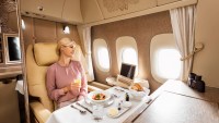 EMIRATES FIRST CLASS BOOK WITH MILES AND POINTS